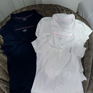 4 old navy girls uniform shirts. 2 navy 2 white